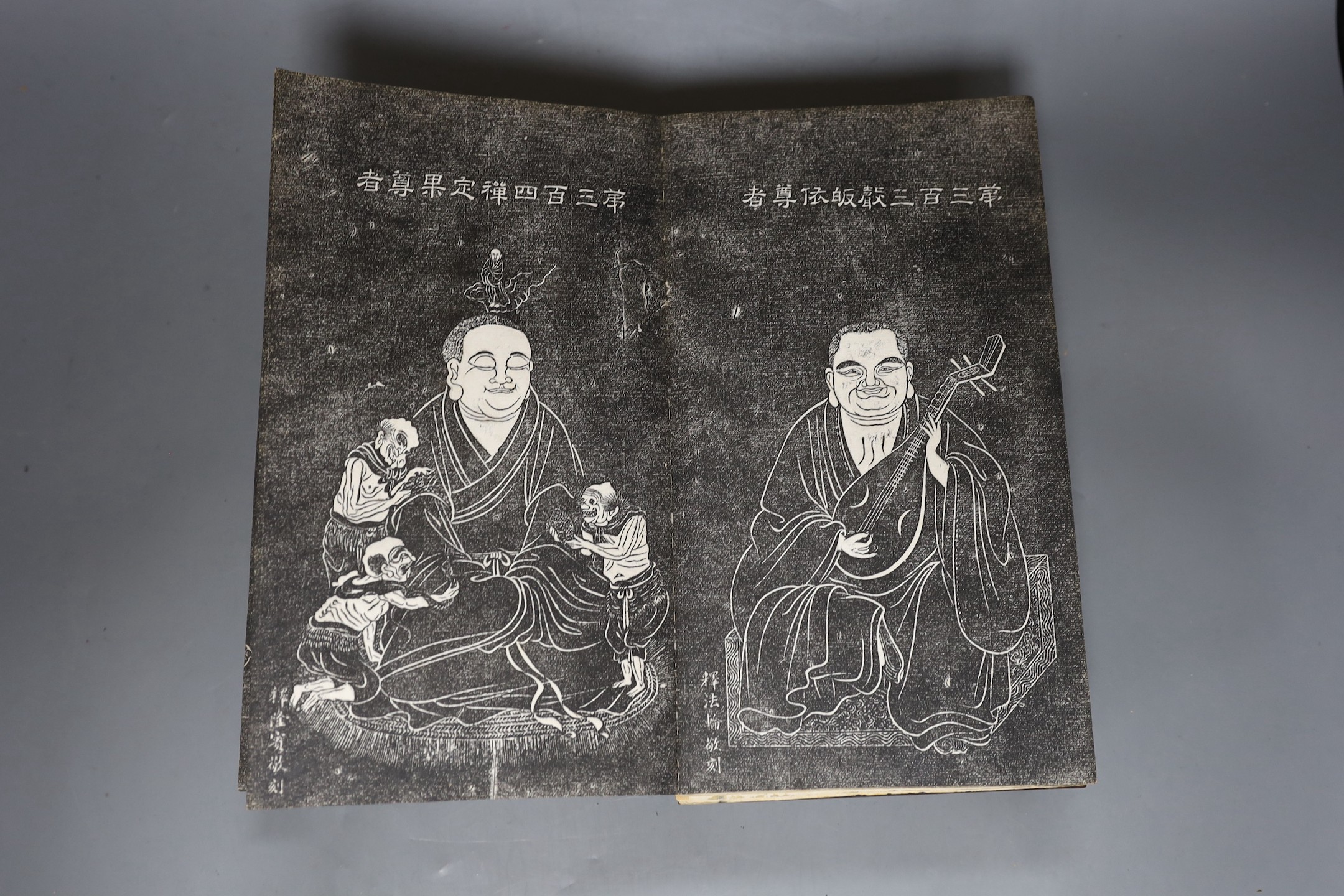 Two Chinese illustrated books Five Hundred Luohan, late Qing dynasty, hongmu covers (detached)